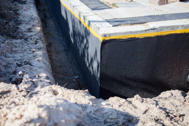 Professional Interior Drainage System technician working in Valley Stream, NY